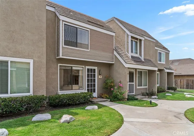 Photo 1 of Townhouse for sale at 14 Greenleaf, Irvine, CA 92604 | MLS# OC26163116 | Listing updated on 2026-09-13