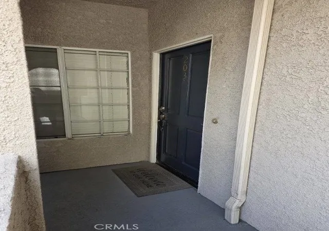 Photo 3 of Condo for sale at 4591 Warner Ave #203, Huntington Beach, CA 92649 | MLS# OC26163772 | Listing updated on 2026-09-29