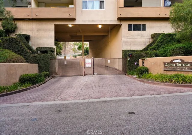 Listing Photo 1 - Condo for sale in building located at 1935 Alpha Rd, Glendale, CA 91208 - Unit #230