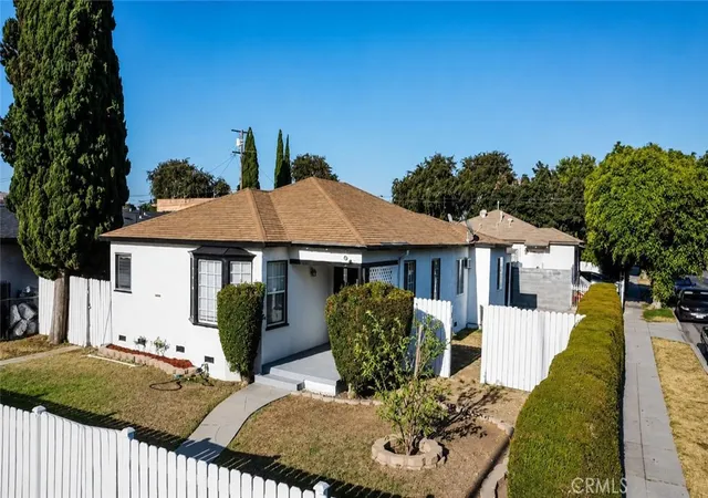 Photo 1 of Single family home for sale at 10142 San Carlos, South Gate, CA 90280 | MLS# DW26163443 | Listing updated on 2026-09-01