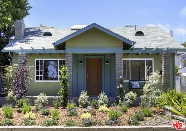 Photo 1 of Multi family home for sale at 1561 Carmona Ave, Los Angeles, CA 90019 | MLS# 26865249 | Listing updated on 2026-10-07