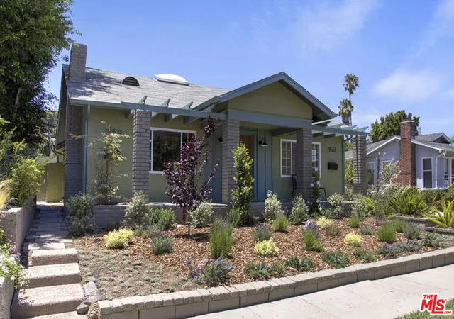 Photo 2 of Multi family home for sale at 1561 Carmona Ave, Los Angeles, CA 90019 | MLS# 26865249 | Listing updated on 2026-10-07