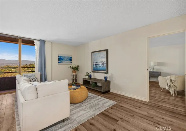 Listing Photo 1 - Condo for sale in building located at 24055 Paseo Del Lago, Laguna Woods, CA 92637 - Unit #1162