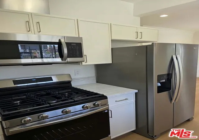 Photo 3 of Single family home for sale at 1445 N Mariposa Ave, Los Angeles, CA 90027 | MLS# 26867117 | Listing updated on 2026-10-10
