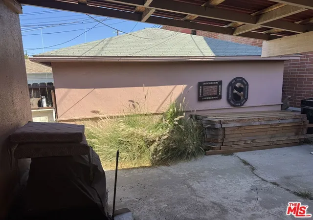 Listing Photo 1 - Condo for sale in building located at 9024 Reading Ave, Los Angeles, CA 90045 - Unit #