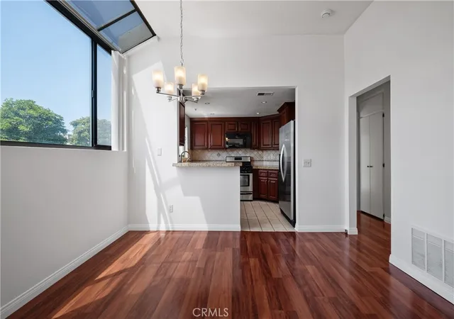 Listing Photo 4 - Condo for sale in building located at 17652 Sergio Cir, Huntington Beach, CA 92647 - Unit #202