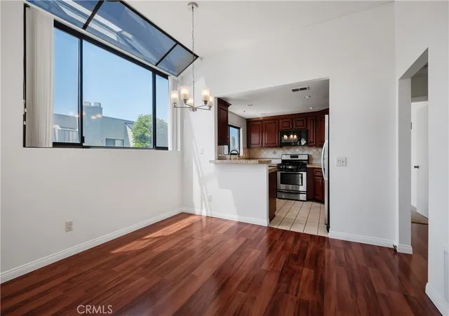 Listing Photo 5 - Condo for sale in building located at 17652 Sergio Cir, Huntington Beach, CA 92647 - Unit #202