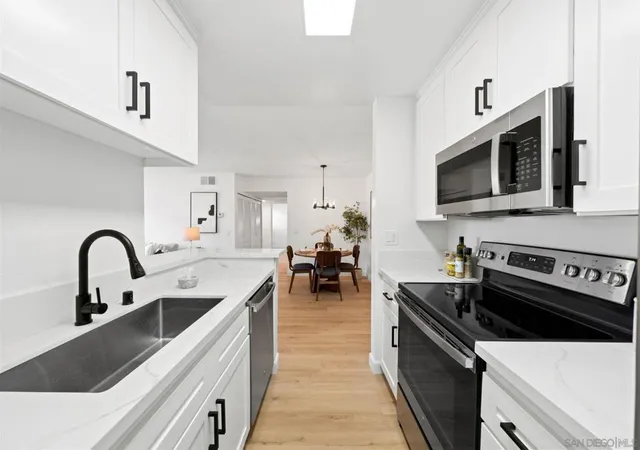 Listing Photo 1 - Condo for sale in building located at 6171 Rancho Mission Rd, San Diego, CA 92108 - Unit #214