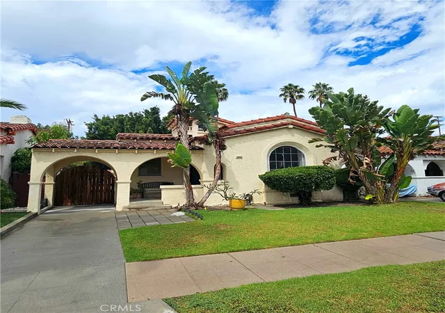 Single family home for sale at 1715 S Ogden Dr, Los Angeles, CA 90019 | MLS# SB26174862