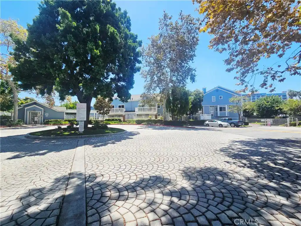 Listing Photo 1 - Condo for sale in 12864 Sycamore Vlg Dr located at 12864 Sycamore Vlg Dr, Norwalk, CA 90650 - Unit 12864 Sycamore Village Dr