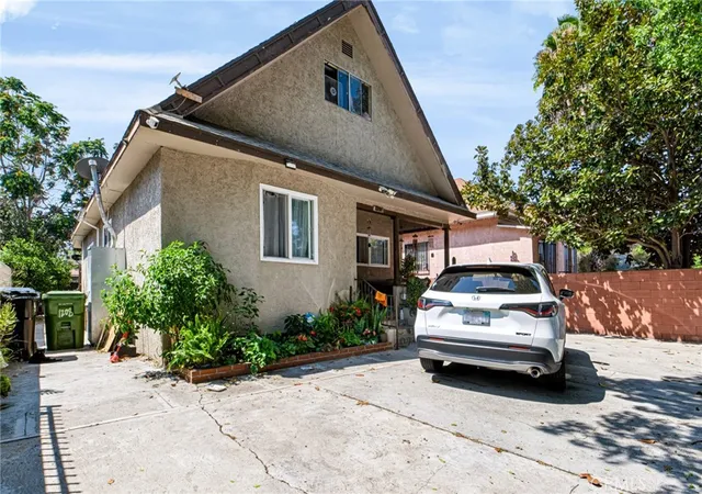 Photo 1 of Multi family home for sale at 1208 E 34th St Los Angeles Ca, Los Angeles, CA 90011 | MLS# MB26180319 | Listing updated on 2026-09-22