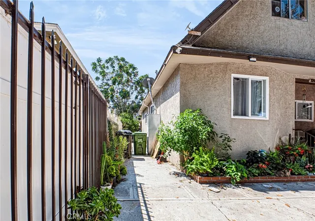 Photo 2 of Multi family home for sale at 1208 E 34th St Los Angeles Ca, Los Angeles, CA 90011 | MLS# MB26180319 | Listing updated on 2026-09-22