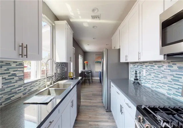 Photo 1 of Multi family home for sale at 1939 W 36th Place, Los Angeles, CA 90018 | MLS# SB26181400 | Listing updated on 2026-09-29