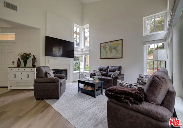 Listing Photo 1 - Condo for sale in building located at 12630 Springbrook Dr, San Diego, CA 92128 - Unit #E