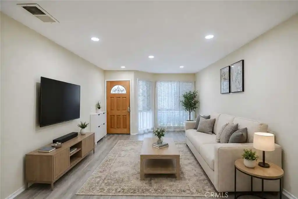 Listing Photo 1 - Condo for sale in 12635 Briarglen Loop located at 12635 Briarglen Loop, Stanton, CA 90680 - Unit 12635 Briarglen Loop