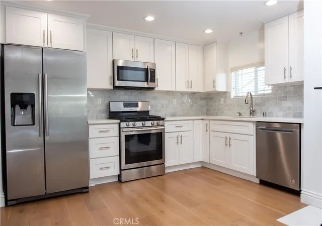 Listing Photo 1 - Condo for sale in building located at 815 S Harvard Blvd, Los Angeles, CA 90005 - Unit #201