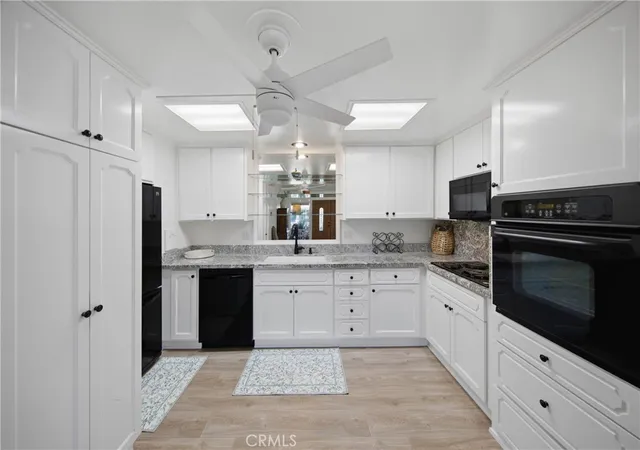 Listing Photo 1 - Condo for sale in building located at 1701 Tam O'shanter Dr, Seal Beach, CA 90740 - Unit #11K