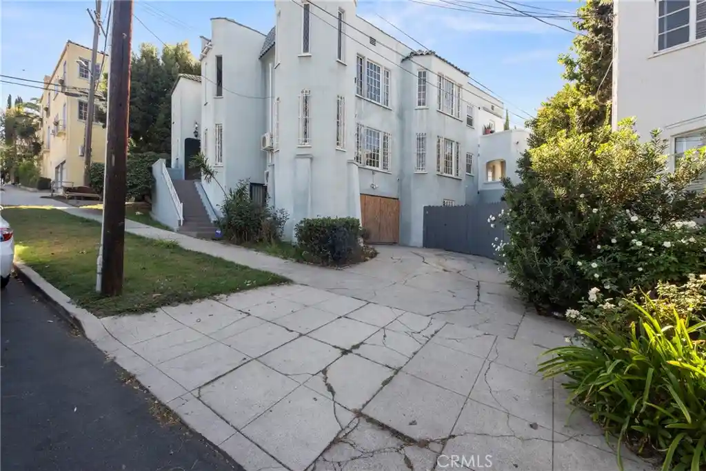 Multi family home for sale at 4916 W 12Th, Los Angeles, CA 90019 | MLS# SR26185421