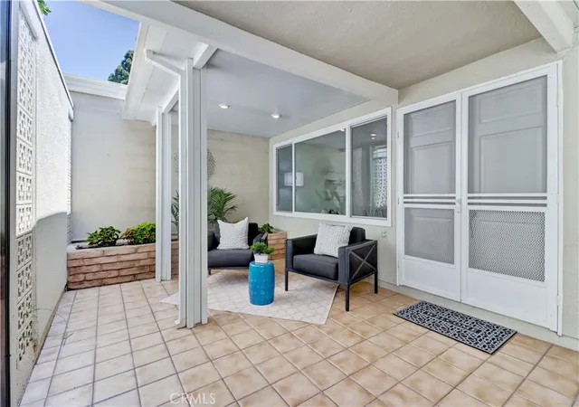 Listing Photo 1 - Condo for sale in building located at 310 Avenida Castilla, Laguna Woods, CA 92637 - Unit #D