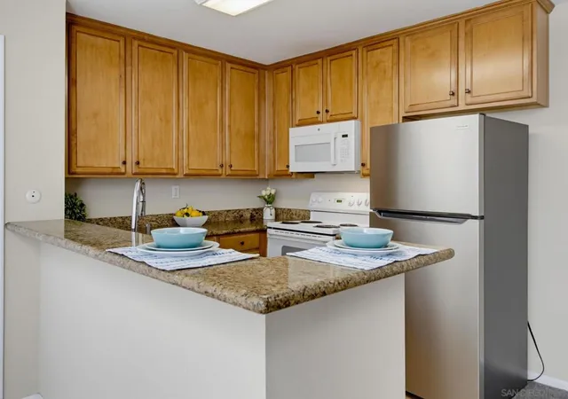 Listing Photo 1 - Condo for sale in building located at 3456 Castle Gln Dr, San Diego, CA 92123 - Unit #256