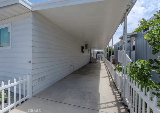 Photo 3 of Manufactured home for sale at 107 S Portola Ln, Tustin, CA 92780 | MLS# PW26189298 | Listing updated on 2026-10-02