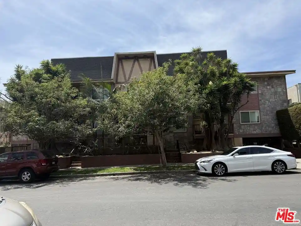 Listing Photo 1 - Condo for sale in 1849 Greenfield Ave located at 1849 Greenfield Ave, Los Angeles, CA 90025 - Unit #106