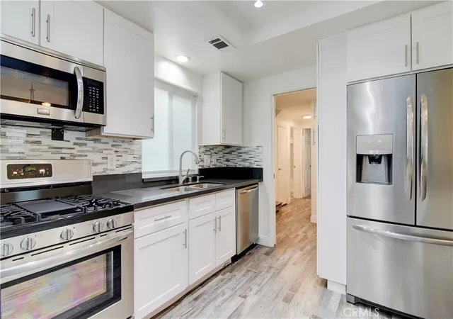 Listing Photo 5 - Condo for sale in building located at 810 Baker, Costa Mesa, CA 92626 - Unit #106