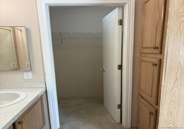Photo 3 of Manufactured home for sale at 4838 1/2 Old Cliffs Rd, San Diego, CA 92120 | MLS# 260021387SD | Listing updated on 2026-09-25