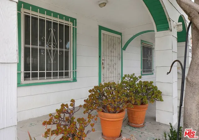 Photo 3 of Single family home for sale at 1271 S Mullen Ave, Los Angeles, CA 90019 | MLS# 26934799 | Listing updated on 2026-09-17