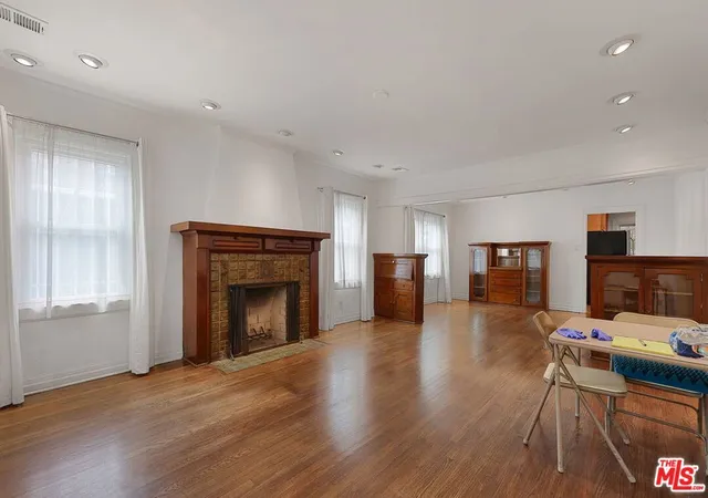 Photo 4 of Single family home for sale at 1271 S Mullen Ave, Los Angeles, CA 90019 | MLS# 26934799 | Listing updated on 2026-09-17