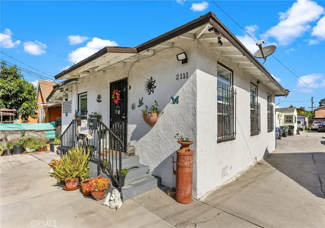 Photo 1 of Multi family home for sale at 2111 E 118th Street, Los Angeles, CA 90059 | MLS# DW26192040 | Listing updated on 2026-10-12
