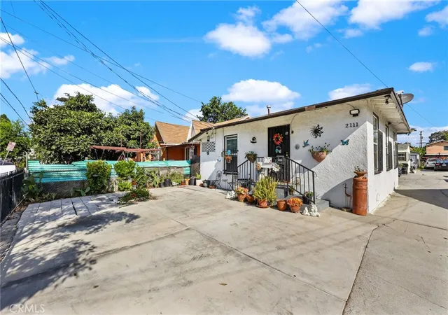 Photo 3 of Multi family home for sale at 2111 E 118th Street, Los Angeles, CA 90059 | MLS# DW26192040 | Listing updated on 2026-10-12