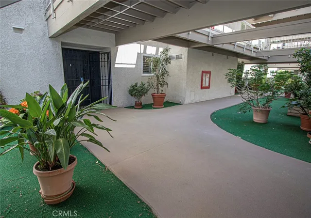 Listing Photo 1 - Condo for sale in building located at 3242 San Amadeo, Laguna Woods, CA 92637 - Unit #1A