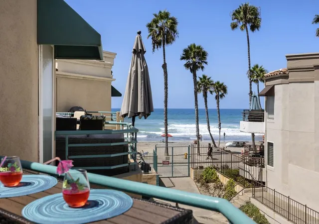 Listing Photo 1 - Condo for sale in building located at 400 N The Strand, Oceanside, CA 92054 - Unit #4