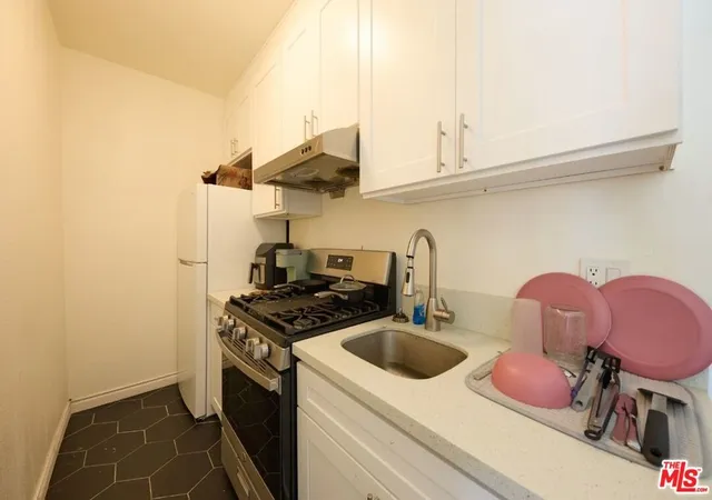 Photo 3 of Multi family home for sale at 1475 W 28th Street, Los Angeles, CA 90007 | MLS# 26959483 | Listing updated on 2026-09-13