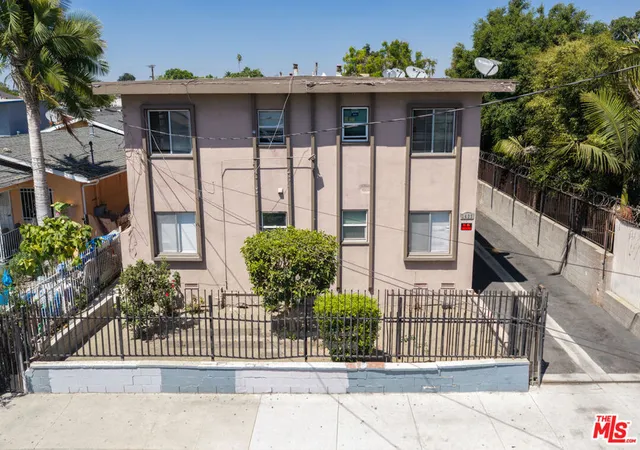 Photo 1 of Multi family home for sale at 1433 E 61st Street, Los Angeles, CA 90001 | MLS# 26969467 | Listing updated on 2026-09-23