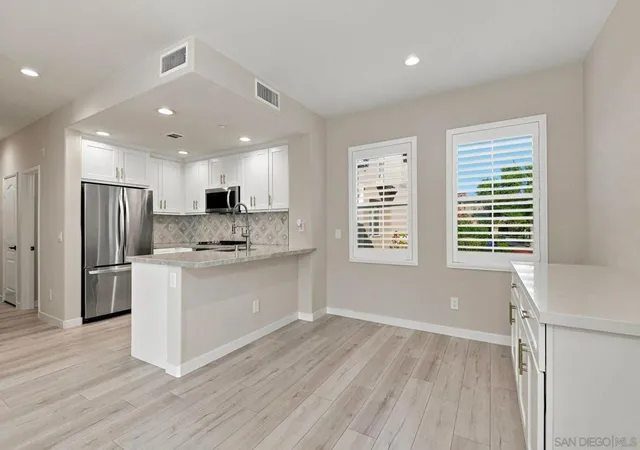 Listing Photo 5 - Condo for sale in building located at 17023 Calle Trevino, San Diego, CA 92127 - Unit #2