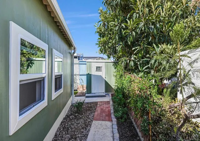 Photo 3 of Manufactured home for sale at 4942 1/2 Old Cliffs Rd, San Diego, CA 92120 | MLS# 260021885SD | Listing updated on 2026-09-12