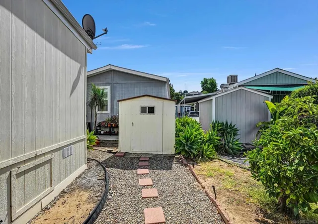 Photo 3 of Manufactured home for sale at 4922 1/2 Old Cliffs Rd, San Diego, CA 92120 | MLS# 260021887SD | Listing updated on 2026-09-13