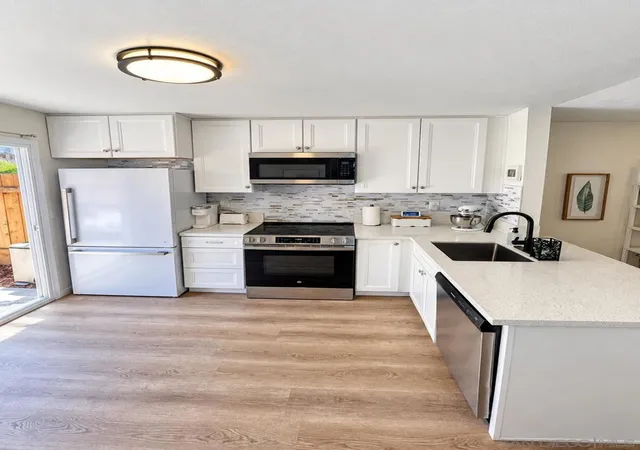Townhouse for sale at 6576 Bell Blf Ave #B, San Diego, CA 92119 | MLS# 260021964SD