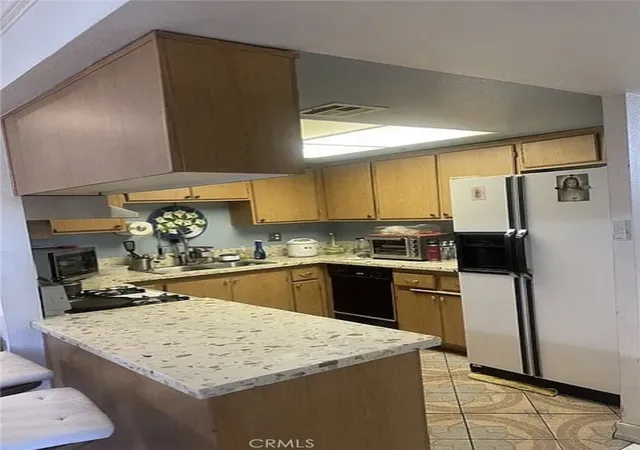 Photo 3 of Condo for sale at 7018 Rita Ave, Huntington Park, CA 90255 | MLS# DW26196872 | Listing updated on 2026-09-10