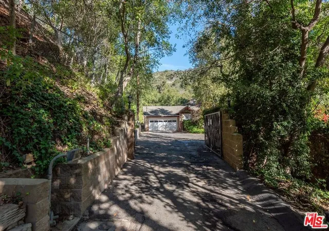 Photo 2 of Single family home for sale at 1702 Crater Ln, Los Angeles, CA 90077 | MLS# 26876073 | Listing updated on 2026-10-10