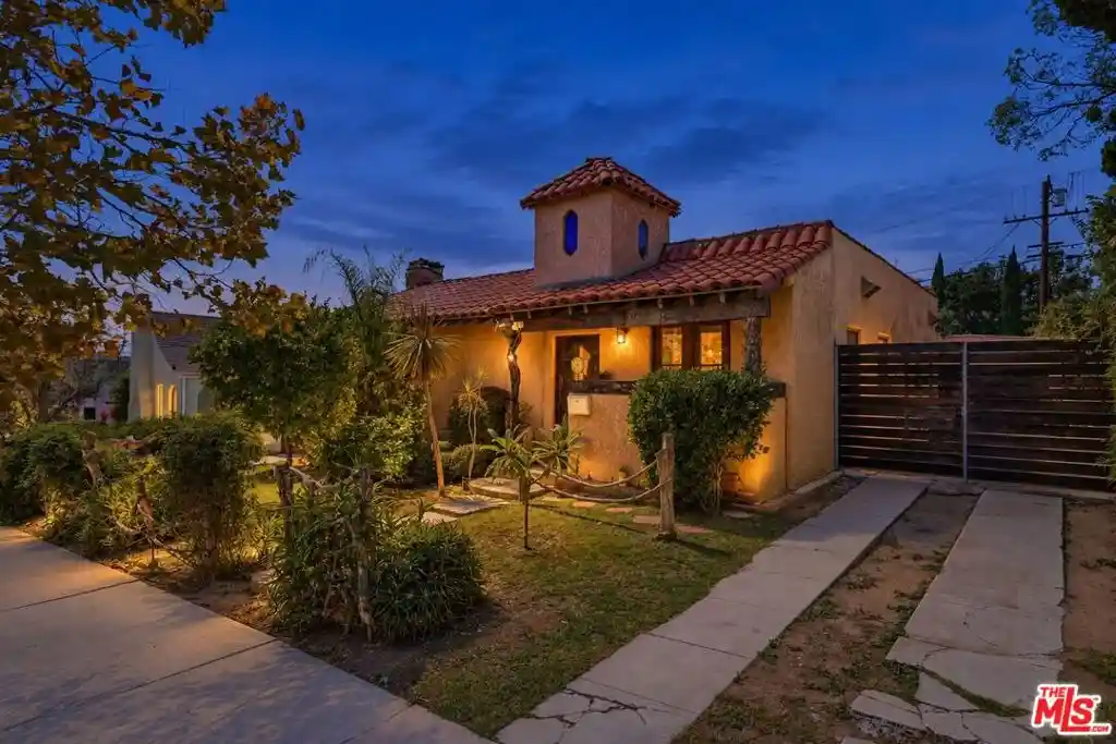 Single family home for sale at 1309 Carmona Ave, Los Angeles, CA 90019 | MLS# 26986383