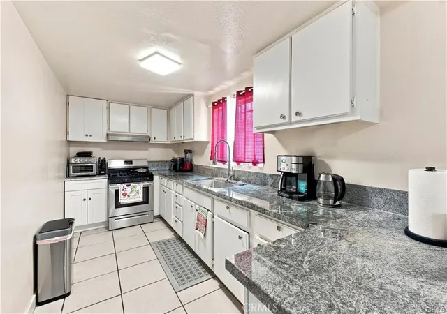 Photo 3 of Multi family home for sale at 17317 Marygold, Bloomington, CA 92316 | MLS# TR26200564 | Listing updated on 2026-09-16