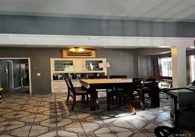 Single family home for sale at 718 W 43rd Place, Los Angeles, CA 90037 | MLS# DW26202498