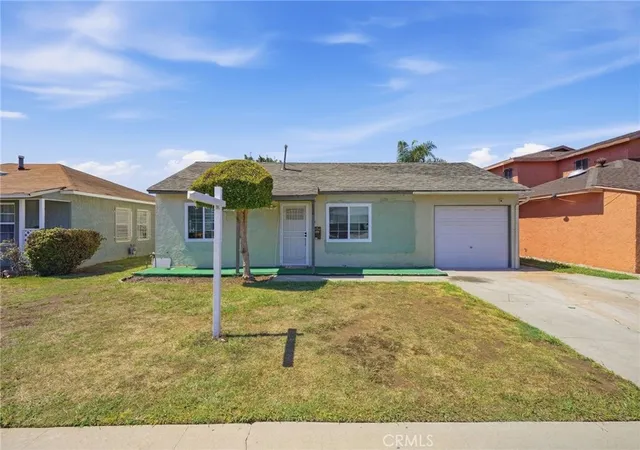 Single family home for sale at 725 S Taper, Compton, CA 90220 | MLS# RS26203423