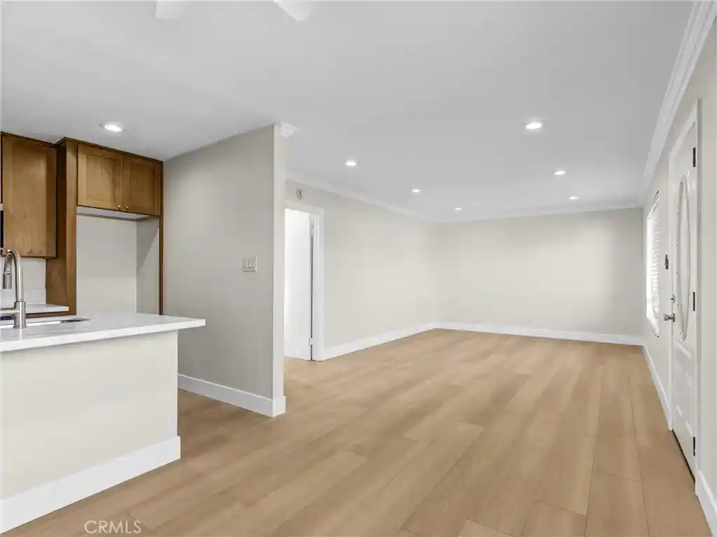 Listing Photo 1 - Condo for sale in 5530 Ackerfield Ave located at 5530 Ackerfield Ave, Long Beach, CA 90805 - Unit #210