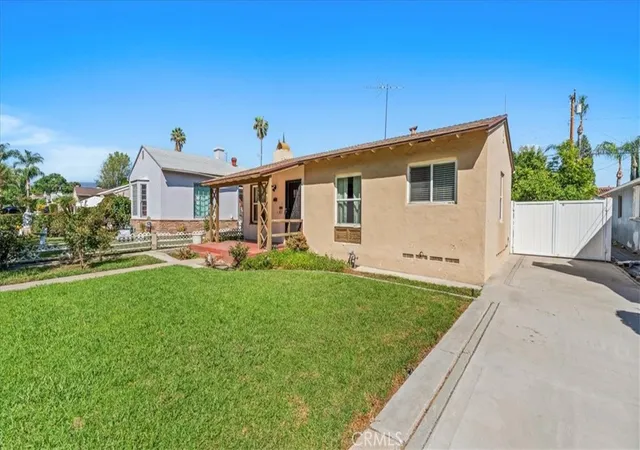 Photo 2 of Single family home for sale at 1502 N White Ave, Pomona, CA 91768 | MLS# CV26203092 | Listing updated on 2026-10-10