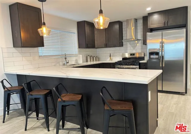 Photo 3 of Multi family home for sale at 1321 W 30th Street, Los Angeles, CA 90007 | MLS# 26989917 | Listing updated on 2026-09-29