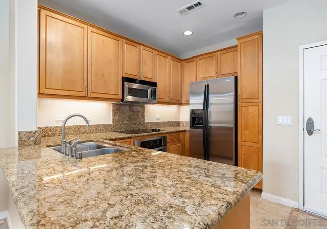 Listing Photo 4 - Condo for sale in building located at 3877 Pell Pl, San Diego, CA 92130 - Unit #429